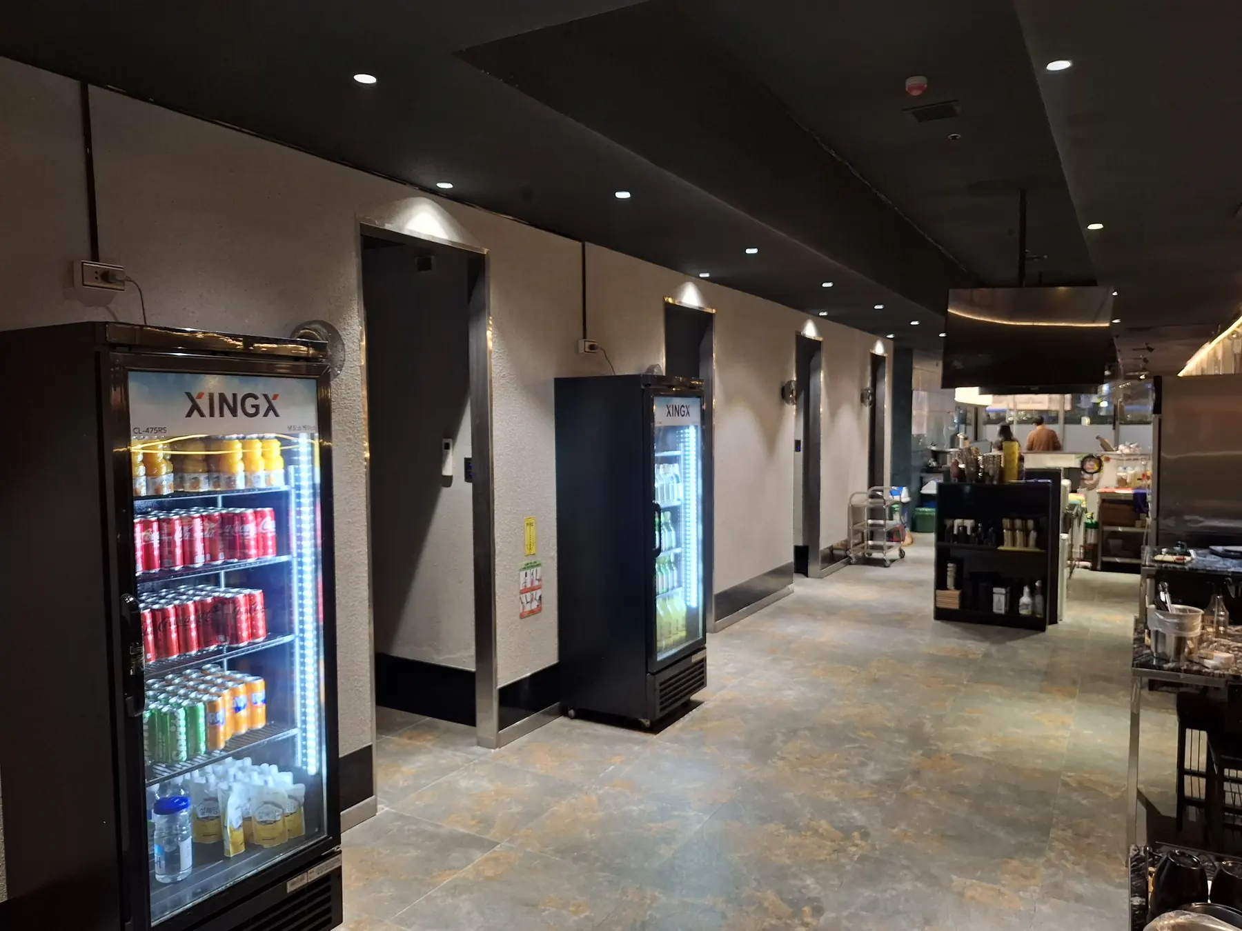 The drinks fridge by the service counter